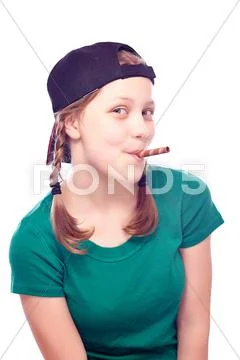 Happy teen girl in cap Stock Photos