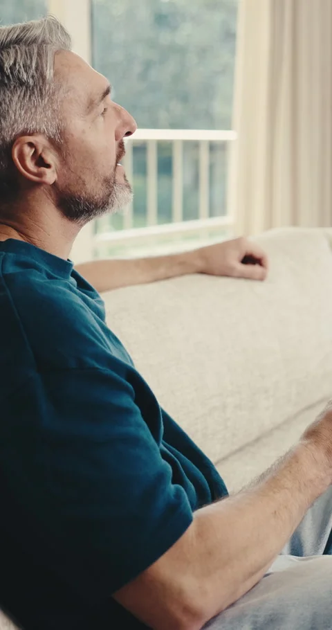Happy, thinking and man with drink on sofa for reflection, calm and peaceful Stock Footage 342325404