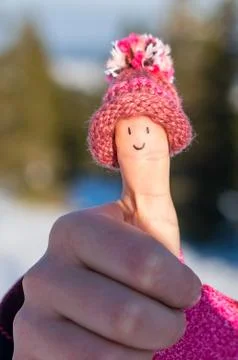 Happy thumb with cap Stock Photos