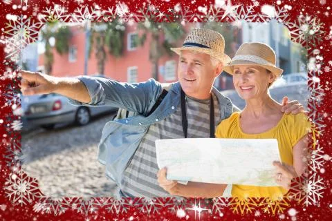 Happy tourist couple using map in the city Ilustração Stock