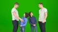 The happy twin brothers stand on the green background 4k or 4k+ Resolution
