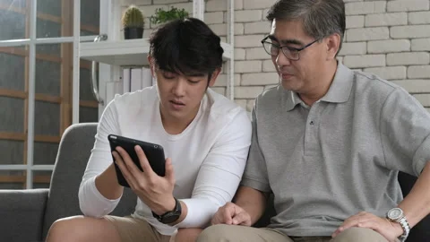 Happy two age generations asian men family old father embracing  Stock Footage 139663963
