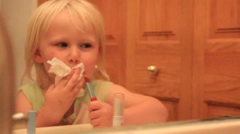 Happy two year wipes her lips Video stock 41651445