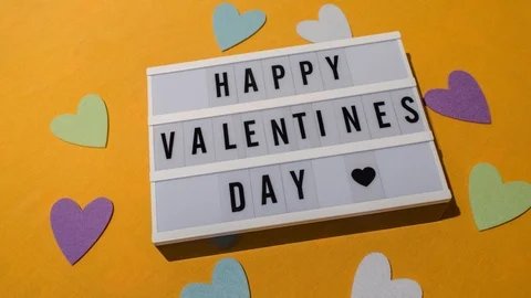 "Happy Valentine's day" sign displayed on a lightbox Stock Footage