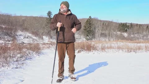 A happy winter hike in the snow Stock Footage 231406152