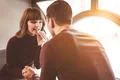 The happy woman and a man drink a cockteil on the restaurant Photo