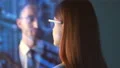 The happy woman and a man talking on the hologram background 4k or 4k+ Resolution