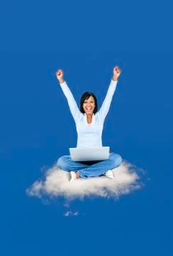 Happy woman computing on cloud Stock Photos