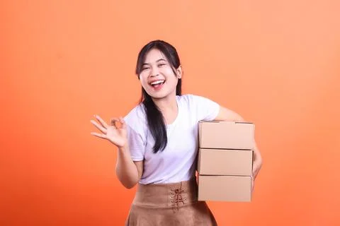 Happy Woman Delivering Packages Stock Photos