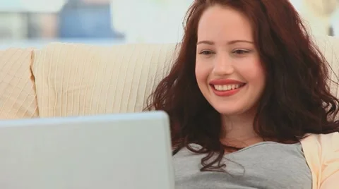 Happy woman dressing in a business suit laughing Stock Footage