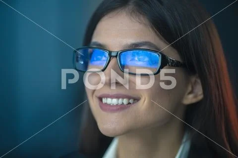 The happy woman in glasses Stock Photos