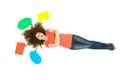 The happy woman lay near the dialog signs. View from above Photo