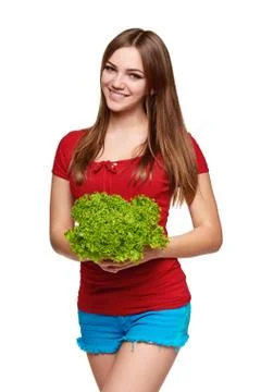 Happy woman with lettuce Stock Photos