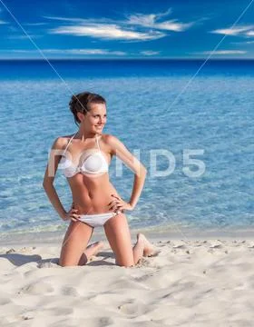 Happy woman near the sea Stock Photos