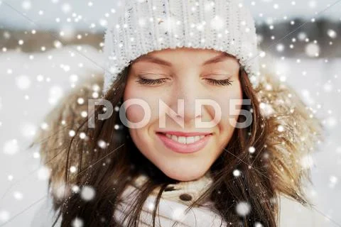 Happy woman outdoors in winter Stock Photos
