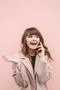 The happy woman phone on the pink wall background Photo