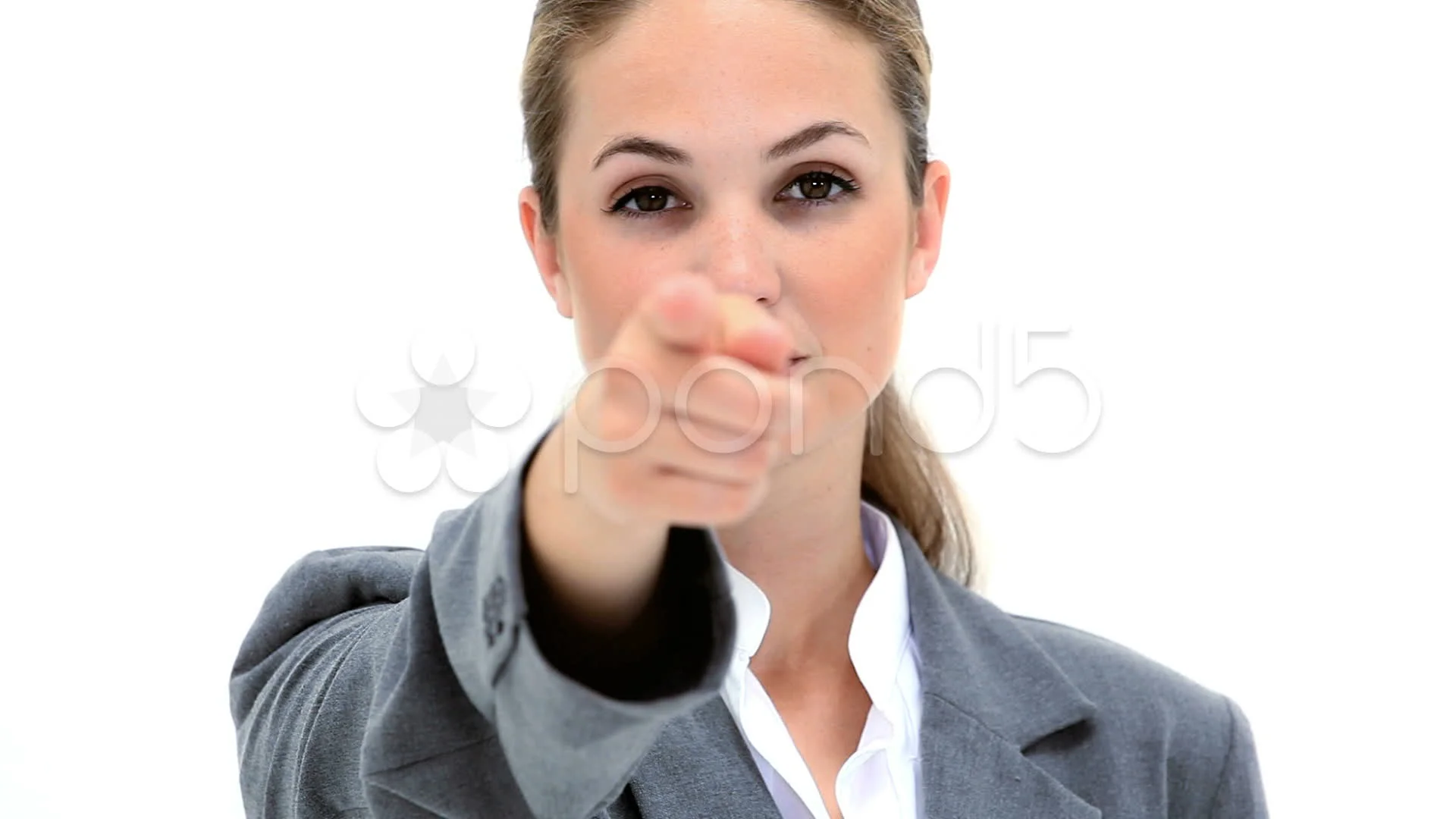 Happy woman pointing her finger