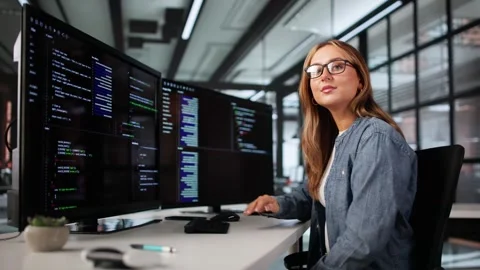 Happy Woman Programmer Working On Multiple Software Screens Stock Footage 311735023