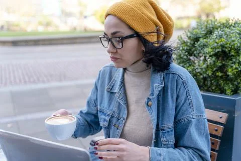 Happy woman student e learning distance training course study working in ca.. Stock Photos
