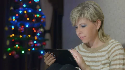 Happy woman using tablet Stock Footage 56448502