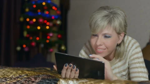 Happy woman using tablet Stock Footage 56448628