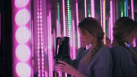 Happy woman is using vr glasses and surprising by virtual reality. Slow mo Stock Footage 87186613