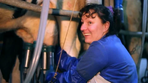 Happy Woman working on Dairy Farm Stock Footage