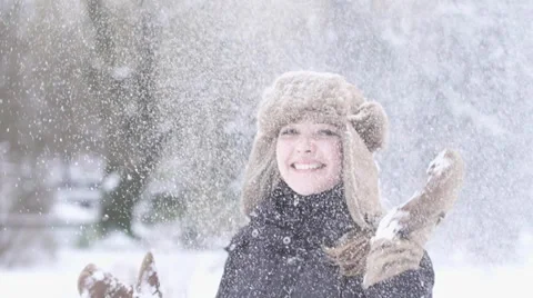 Happy women exited playing spinning fun snow fall winter time slow motion Stock Footage