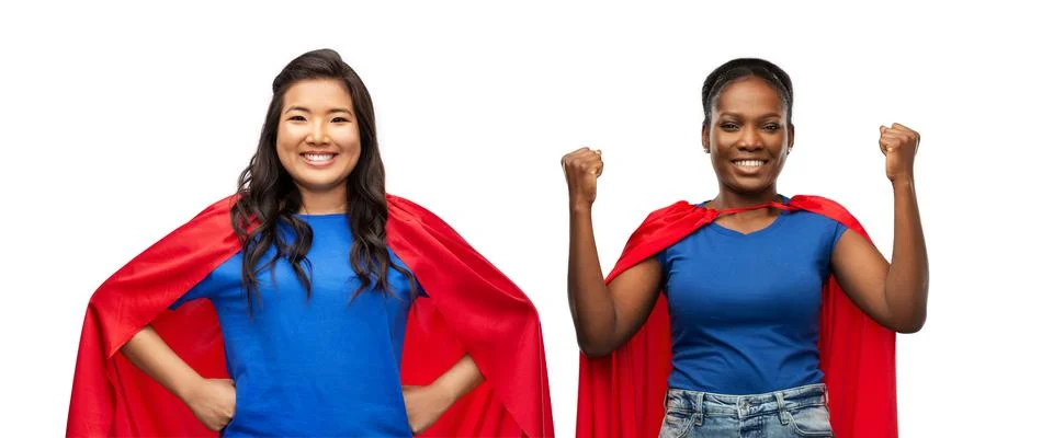 Happy women in red superhero capes Stock Photos