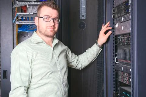 A happy worker technician at work with computer Foto stock