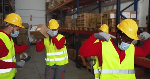 Happy workers dancing inside warehouse Stock Footage 145427780