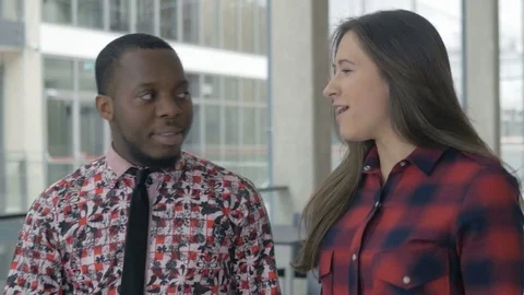 Happy workers enjoying a break while walking in a spacious office building Stock-Footage 73852201