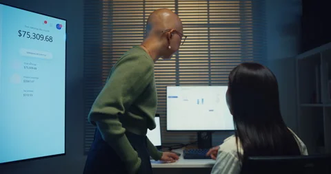 Happy young Asian co-worker team smile and brainstorm together in office night. Video stock 340908691
