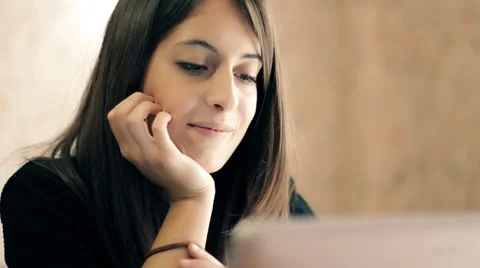 Happy Young Beautiful Woman Using Laptop, Indoors Stock Footage