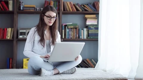 Happy Young Beautiful Woman Using Laptop, Indoors Stock Footage 59352423