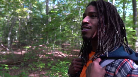 Happy Young Black Man Surrounded by Trees, Social Distancing Stock-Footage 142016236