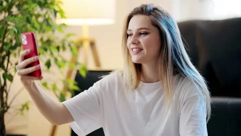 Happy young blonde Long-haired woman with natural beauty talking on smartphone Stock Footage 150102353