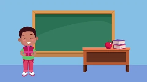 Happy young boy with gift box in classroom in front of blackboard. Stock Footage 334542708