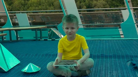 Happy young boy using tablet computer Stock Footage 63426033