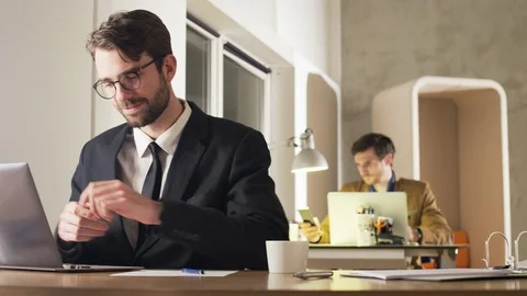 Happy Young Businessman During Work Stock Footage 70922096