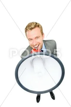Happy young bussinessman shouting with megaphone on white background Stock Photos