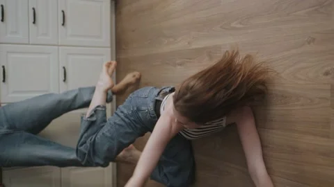 Happy Young Couple Dances in the Kitchen. Vertical 4K UHD Stock Footage 158160345