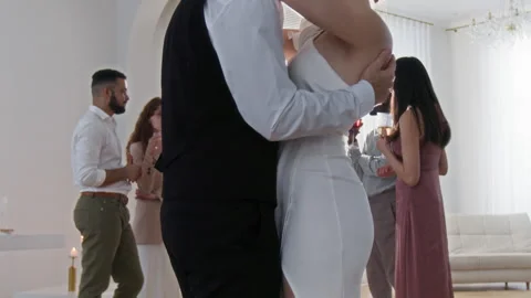 Happy Young Couple Dancing Stockbeeldmateriaal 309827692