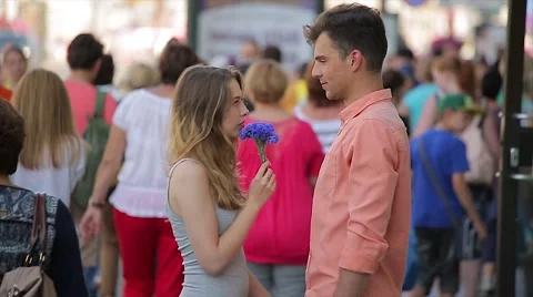 Happy Young Couple Flirting On A Date In The City (Slow Motion). They are Stock Footage 65772473