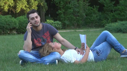Happy young couple is having fun in the park 스톡 동영상 23930872