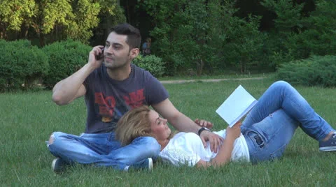 Happy young couple is having fun in the park 스톡 동영상 23933198