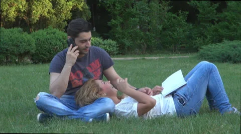 Happy young couple is having fun in the park 스톡 동영상 24170258