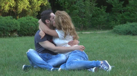 Happy young couple is having fun in the park 스톡 동영상 24691492