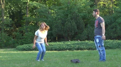 Happy young couple is having fun in the park 스톡 동영상 24691651