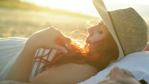 Happy Young Couple Having Fun Outdoors And Smiling. Beautiful Couple Laying On Stock Footage 101751242